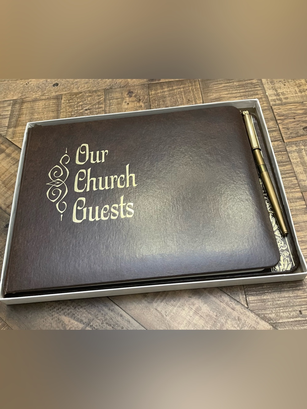 Church guest book with pen